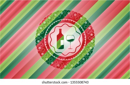 bottle and glass of wine icon inside christmas colors style badge.