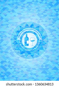 bottle and glass of wine icon inside sky blue emblem. Mosaic background