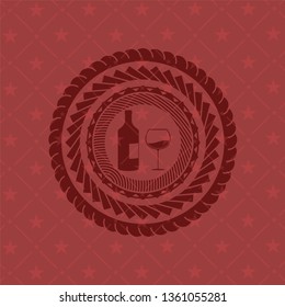 bottle and glass of wine icon inside red emblem. Retro