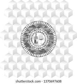 bottle and glass of wine icon inside grey badge with geometric cube white background