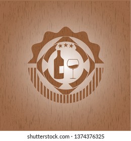 bottle and glass of wine icon inside retro wooden emblem
