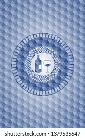 bottle and glass of wine icon inside blue polygonal badge.