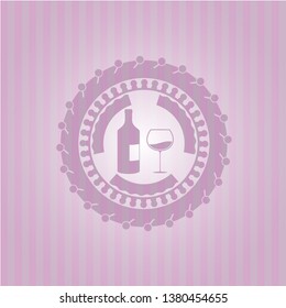 bottle and glass of wine icon inside pink emblem. Retro