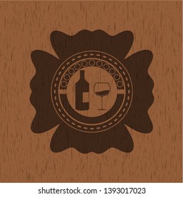 bottle and glass of wine icon inside retro wood emblem