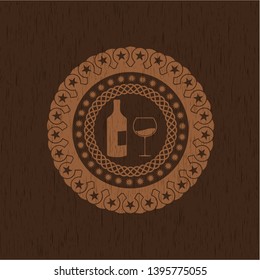 bottle and glass of wine icon inside wood emblem. Vintage.