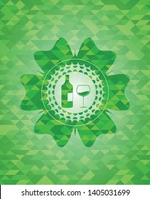 bottle and glass of wine icon inside green emblem with triangle mosaic background
