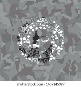 bottle and glass of wine icon inside grey camo texture