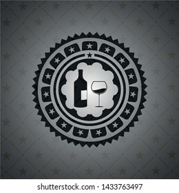 bottle and glass of wine icon inside black badge