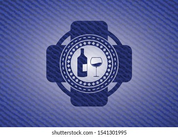 bottle and glass of wine icon inside jean background