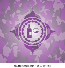 bottle and glass of wine icon inside pink and purple camouflage emblem