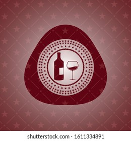 bottle and glass of wine icon inside badge with red background