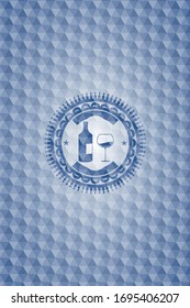 bottle and glass of wine icon inside blue emblem or badge with geometric pattern background.