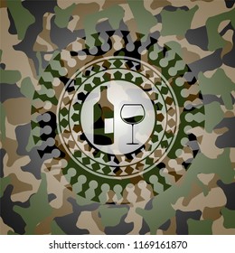 bottle and glass of wine icon on camouflaged pattern