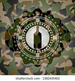 bottle icon inside camouflaged emblem
