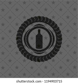 bottle icon inside dark emblem