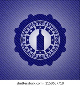 bottle icon inside denim background