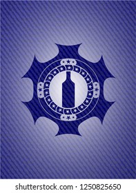 bottle icon inside emblem with jean high quality background