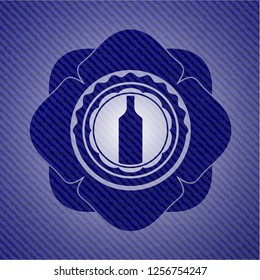 bottle icon inside emblem with jean high quality background