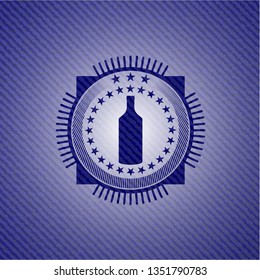 bottle icon inside emblem with jean high quality background