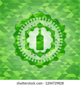 bottle icon inside green emblem with triangle mosaic background