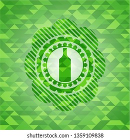 bottle icon inside green mosaic emblem