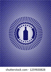 bottle icon inside jean background