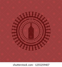 bottle icon inside red emblem