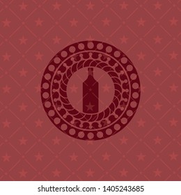 bottle icon inside red emblem