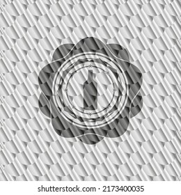 bottle icon inside shiny silver badge. Scales pattern. Vector Illustration. Detailed. 