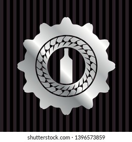 bottle icon inside silvery badge or emblem