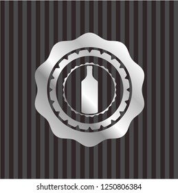 bottle icon inside silvery emblem or badge