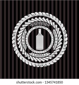 bottle icon inside silvery emblem or badge