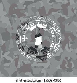 bottle icon on grey camo texture