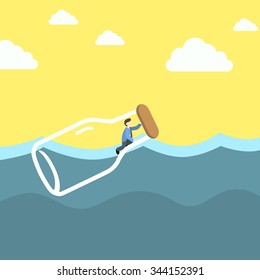 Bottle with man inside floating in the sea. Conceptual image