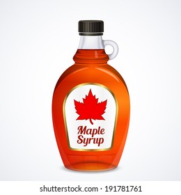 Bottle of maple syrup isolated on white