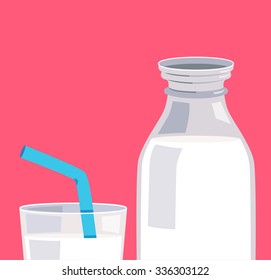 A bottle of milk and a glass of milk.