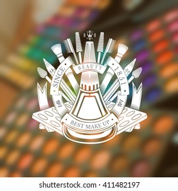 Bottle of nail polish into round ribbon and other type of equipment and cosmetics behind. Silhouette label on blurred photo