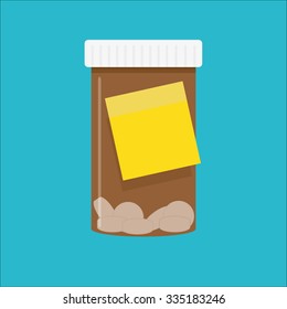 Bottle of pills with a yellow sticky note attached as a reminder perhaps to renew your prescription. With copy space for your text