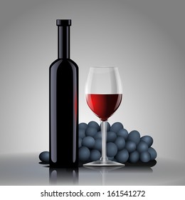 Bottle with red wine with a glass and grapes