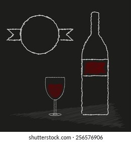 Bottle of red wine on a dark background
