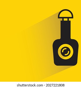 bottle with shadow on yellow background