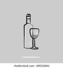 A bottle of wine with a glass