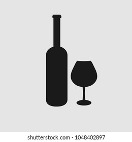 A bottle of wine with a wine glass. Siluet. Icon Vector