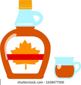 Bottled Maple Syrup And A Pitcher