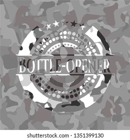 Bottle-opener on grey camouflaged pattern