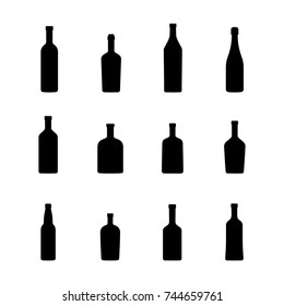 Bottles of alcoholic beverages, black silhouettes. Vector