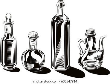 Bottles and glass containers of extra virgin olive oil.
