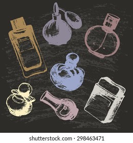 The bottles of perfume drawn by hand  on a blackboard. Vector illustration.