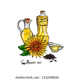 Bottles with sunflower oil, sunflower and a handful of seeds.