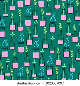 Bottles vector illustration on a green background. Glass bottles with flowers. Pattern to the kitchen. Glass bottles with flowers. Bottles vector illustration on a green background.